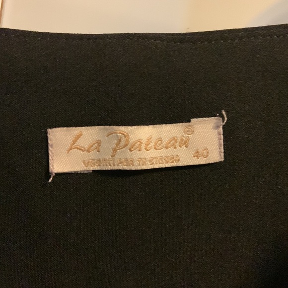 Black Off-Shoulder Statement Top with Bell Sleeves and White Pom Poms - Picture 4 of 6